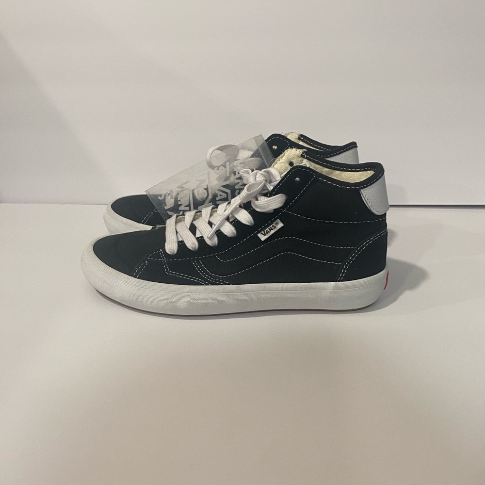 Vans Black and White High-Top Sneakers